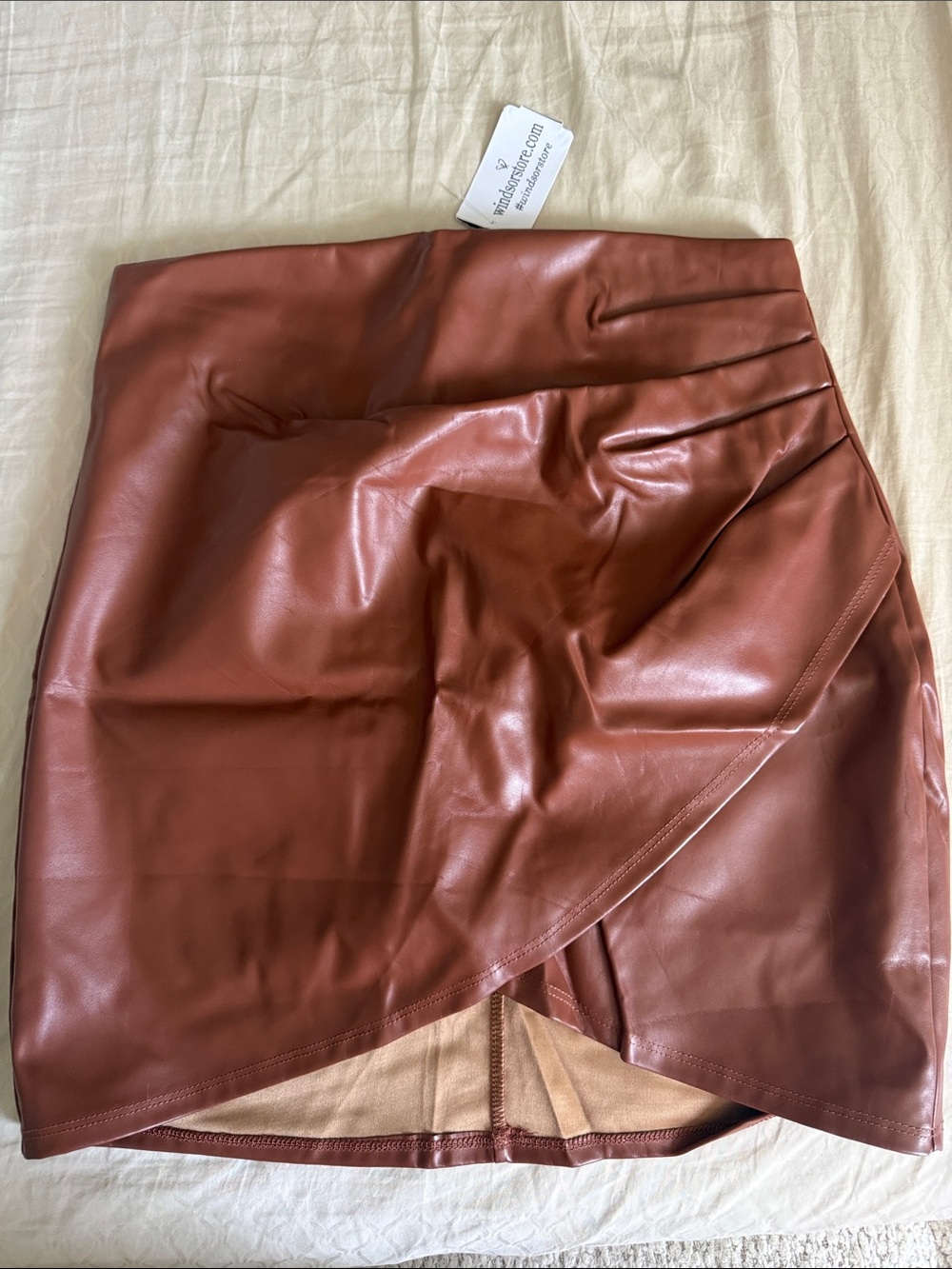 Express Faux Leather Asymmetric Mini Skirt in Cognac Brown